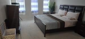 Ένα ή περισσότερα κρεβάτια σε δωμάτιο στο Pearl Properties