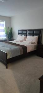 Ένα ή περισσότερα κρεβάτια σε δωμάτιο στο Pearl Properties