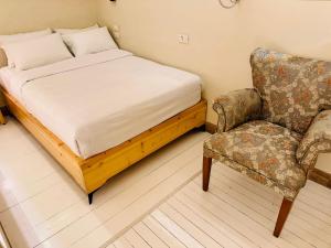 Postel nebo postele na pokoji v ubytování Paris Hotel Cairo