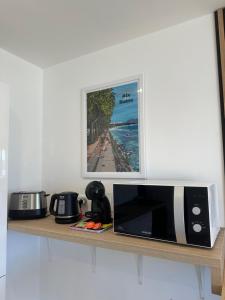 Kuchyň nebo kuchyňský kout v ubytování Sun beach