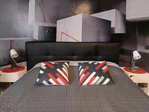 Postel nebo postele na pokoji v ubytování B&B GoodDay Roma Tor Vergata