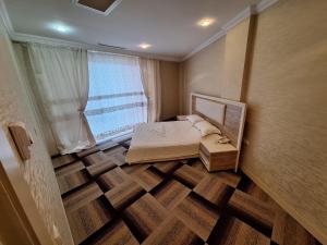 Postel nebo postele na pokoji v ubytování Arena Hotel Khachmaz + 27 fotografií