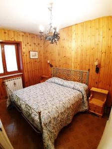 Ένα ή περισσότερα κρεβάτια σε δωμάτιο στο Casa Covelli