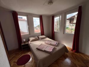 Ένα ή περισσότερα κρεβάτια σε δωμάτιο στο Apartments Misa Lake View