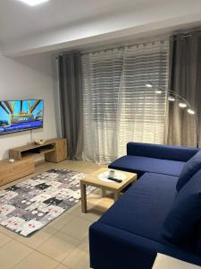 Μια τηλεόραση ή/και κέντρο ψυχαγωγίας στο Natalieva Apartment