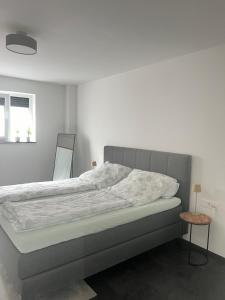 Ένα ή περισσότερα κρεβάτια σε δωμάτιο στο Wohnung in Blaubeuren, Seißen