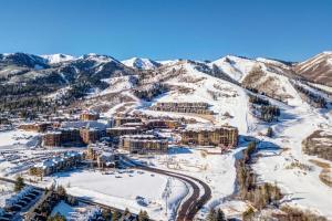 an aerial view of a resort in the snow at Canyons Resort, Community Hot Tub Retreat, Slopes located steps away! in Park City +24 photos