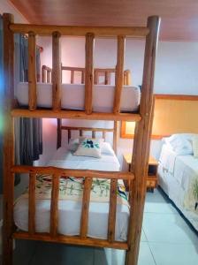 Ένα ή περισσότερα κρεβάτια σε δωμάτιο στο Flats Macapá Meu Amor 11 +13 φωτογραφίες