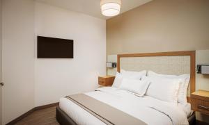 Letto o letti in una camera di The Kulshan Hotel