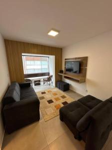 Χώρος καθιστικού στο Apartamento a 100m da praia!