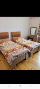 Postel nebo postele na pokoji v ubytování guest house TSVARA