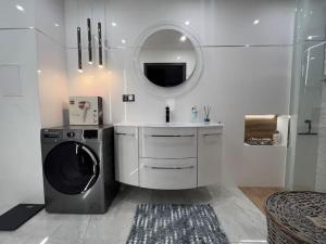 Ένα μπάνιο στο Luxury Apartment 88 m2, 3 bedrooms plus living room +44 φωτογραφίες