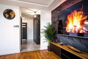 Μια τηλεόραση ή/και κέντρο ψυχαγωγίας στο Luxury Apartment 88 m2, 3 bedrooms plus living room