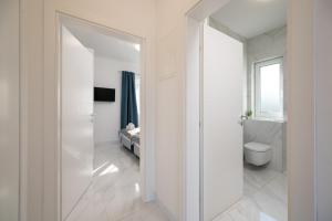 Et badeværelse på Apartments Filipo + 51 billeder