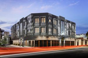 a black building on a city street at Attika Hotel in Perth