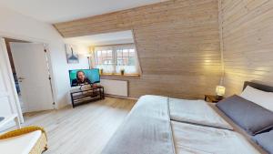 Ein Bett oder Betten in einem Zimmer der Unterkunft Ferienhaus Knippschild