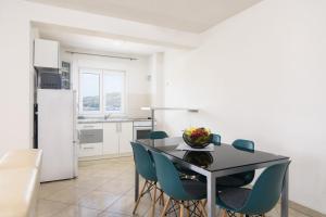 Kuchyň nebo kuchyňský kout v ubytování Apartment Eli