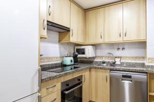 Kuchyňa alebo kuchynka v ubytovaní Apartamento Pink Medsea