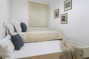 Posteľ alebo postele v izbe v ubytovaní Apartamento Pink Medsea