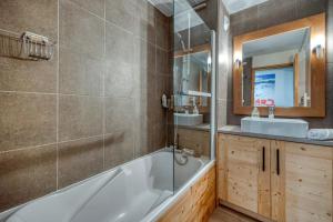 Vannituba majutusasutuses L'Ours Brun - Au Pied des Pistes avec un Parking +25 fotot