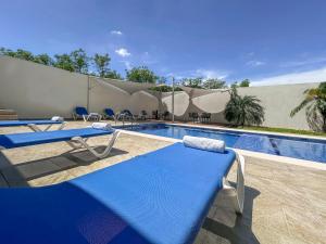 Bazén v ubytování Holiday Inn Express Mérida by IHG nebo v jeho okolí
