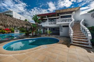 Bazén v ubytování Jaco Laguna Resort & Beach Club nebo v jeho okolí