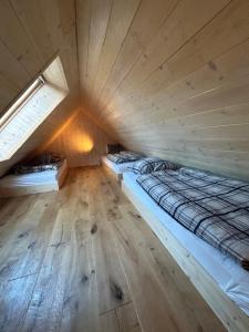 an overhead view of a room with two beds at Gorjuška Rozamunda in Bohinjska Bistrica