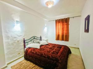 Кровать или кровати в номере P1 duplex vue sur Mer