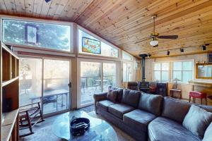 a living room with a couch and a table at Villa Eileen in Guerneville