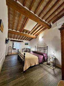 Postel nebo postele na pokoji v ubytování Camere La Carbonaia