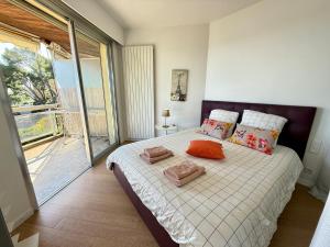 Postel nebo postele na pokoji v ubytování Les Jardins de Villefranche + 29 fotografií