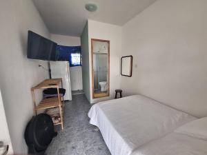 Postel nebo postele na pokoji v ubytování Pousada Recanto turmalina