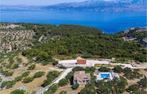 an aerial view of a house next to the water at House Ita in Postira +18 photos