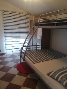 Posteľ alebo postele v izbe v ubytovaní Apartments Sanja