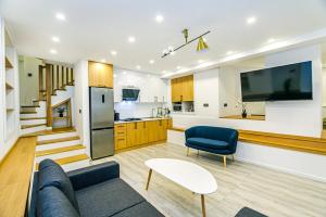 Η κουζίνα ή μικρή κουζίνα στο Nizami Street Dupleks 3 bedroom