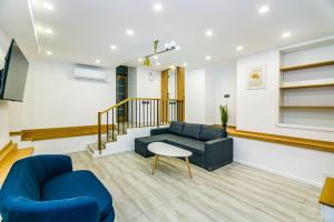 Χώρος καθιστικού στο Nizami Street Dupleks 3 bedroom