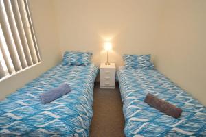 Voodi või voodid majutusasutuse Kalbarri Waters B - Kalbarri, WA toas