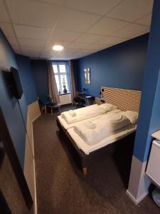 Postel nebo postele na pokoji v ubytování Room 4 in the center of Saeby with free parking