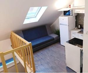 Kuchyňa alebo kuchynka v ubytovaní Csigaház Apartman