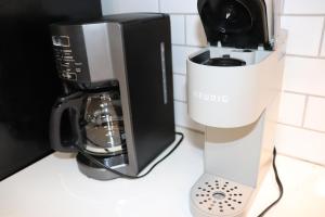 Coffee and tea making facilities at Sandpiper 7-C ON the BEACH- Smart TVs