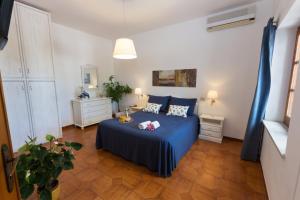 Ένα ή περισσότερα κρεβάτια σε δωμάτιο στο La Marsa Vacances +41 φωτογραφίες