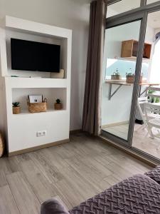 TV o dispositivi per l'intrattenimento presso Lady laying
