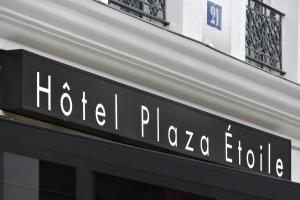 a sign that reads hotel plaza ethiopia on a building at Hôtel Plaza Étoile in Paris