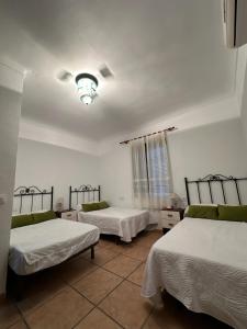 Postel nebo postele na pokoji v ubytování Dehesa Elías + 18 fotografií