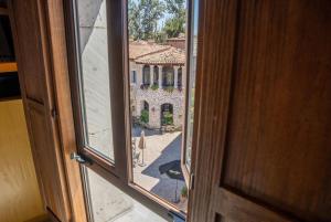 Fotografie z fotogalerie ubytování Suite Raffaello: Diseño y Comodidad en Val'Quirico v destinaci Santeagueda + 2 fotografie