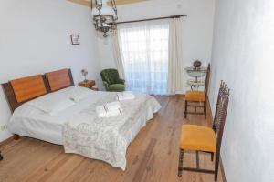 Ένα ή περισσότερα κρεβάτια σε δωμάτιο στο Casa Dona Aninhas - Douro