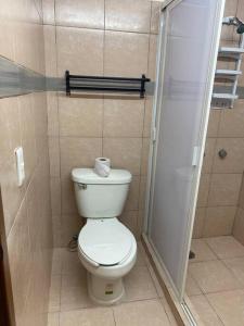 Koupelna v ubytování Departamento en Plaza zafa