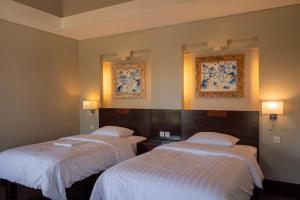 Кровать или кровати в номере Bali Stile villa +27 фотографий