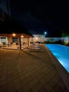 Bazén v ubytování Caribe Maya nebo v jeho okolí