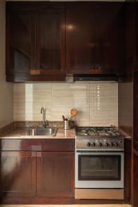 Кухня или мини-кухня в Bali Stile villa
